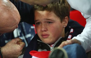 This kid will cheer right up when he reads the Offside!