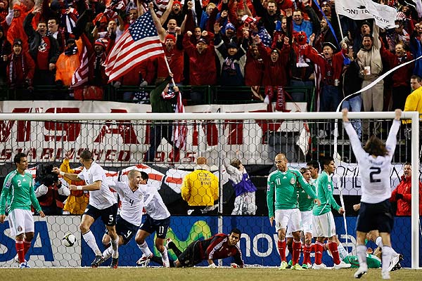 Mexico looks on as US scores their first goal Feb 11 2009
