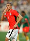 Mo Zidan blows kisses